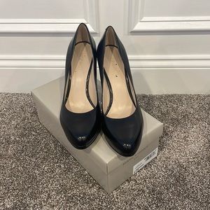 Nine West, black leather pumps.